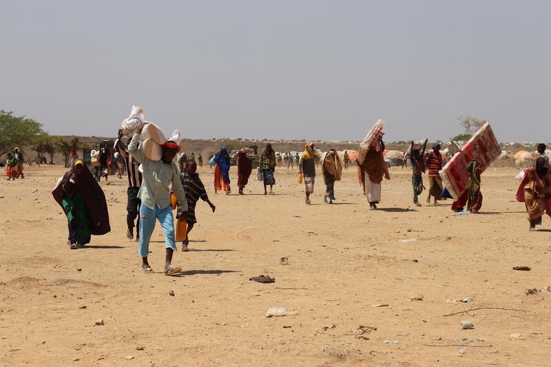 People walk in a barren land leaving their villages_Somalia