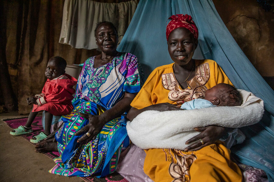 Nyariek Bol cradles son Tesloach, who was born a healthy 3.5 kilos thanks to key and timely nutritional support by WFP and partners. Photo: WFP/Gabriela Vivacqua