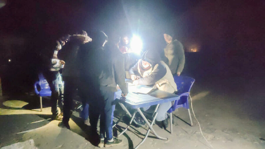 WFP deliveries of hot meals and ready-to-eat rations to survivors continue into the night. Photo: WFP/Lina Alqassab
