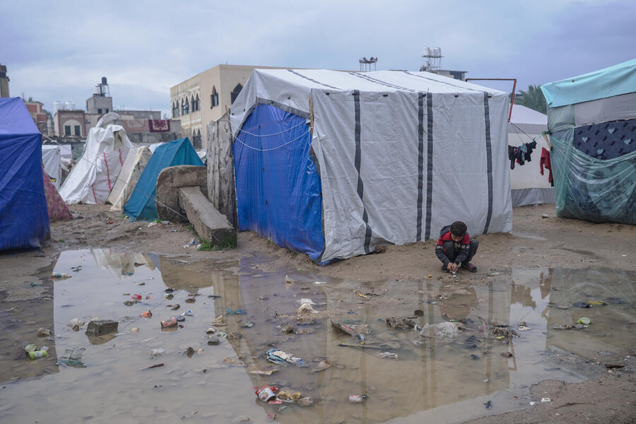 With no infrastructure like running water, sewage, or electricity, the winter rains flood improvised camps like this leaving people struggling with cold, mud and illness. Photo: WFP/Jaber Badwan