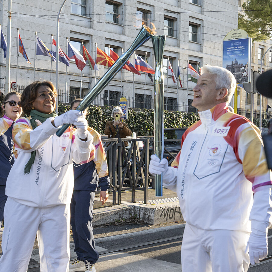 Olympic Torch with AED PI Rania Dagash-Kamara